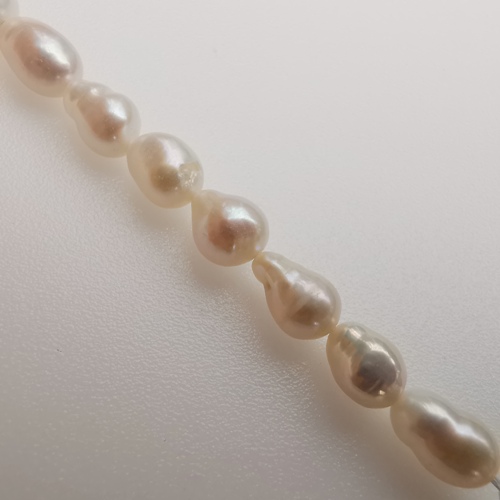 Freshwater Cultured Ivory Baroque Pearls 8-10x7mm